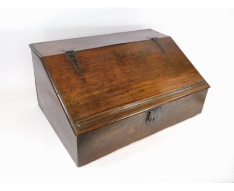 OAK BIBLE BOX. An early oak Bible box, the interior fitted with six drawers. W70xH31xD47cm.NOTE: Our postal shipping service 