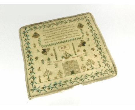 SAMPLER. An early 19th century unframed sampler, stitched by Mary Fox, age 11 years, 1833. Featuring a house, urns of flowers