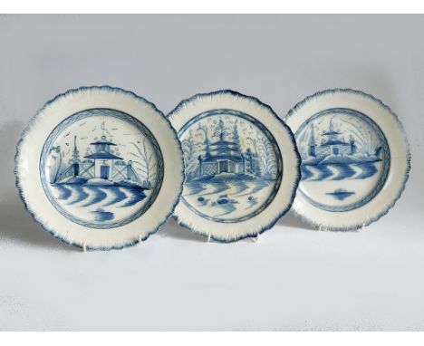 PEARLWARE PLATES. Three 19th century pearlware plates, each hand painted with a chinoiserie style building, each diameter 25c