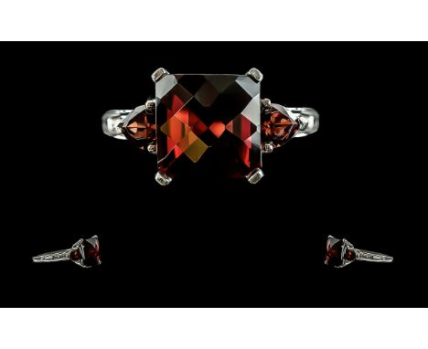 Ladies 9ct White Gold Faceted Garnet and Diamond Set Dress Ring, Marked 9ct to Shank. The Large Faceted Garnet of Very Good C