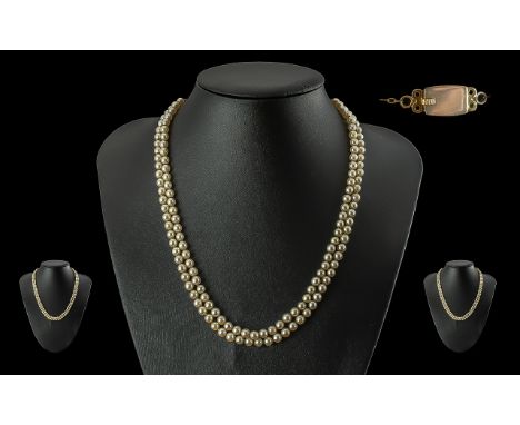 Ladies - Excellent Quality Vintage River Pearl Double Strand Necklace with 14ct Gold Clasp. Weight 28,2 grams. Length 18 Inch