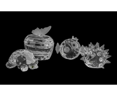 Four Pieces of Swarovski Crystal, all in original boxes from Roy Lunt of St. Helen's, comprising a fish, a trinket box with a