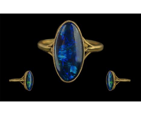 Ladies 18ct Gold Single Opal Set Ring - Full Hallmark To Interior Of Shank. The Elongated Oval Shaped Opal of Excellent Colou