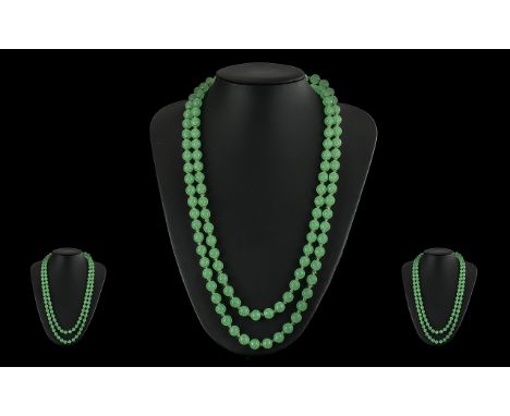 A Vintage Green Jade Beaded Necklace - Knotted of Long Length 48'' (120 cm) Excellent Colour. Weight 108.45 grams. Superb Con