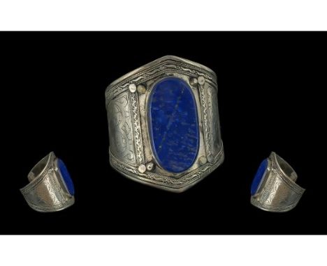 Large Lapis Cuff, 800 white metal.  Large oval Lapis set in wide white metal bangle decorated with engraving.