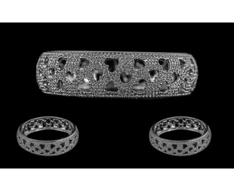 Beautiful Swarovski Crystal Bangle, with cut out heart shapes, in original box and outer box.  With certificates.