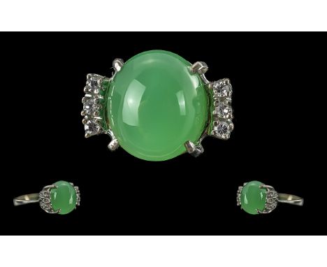 14ct White Gold - Pleasing Quality Jade and Diamond Set Ring, The Cabochon Cut Jade Stone of Lovely Colour, Flanked by Six Sm