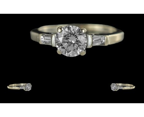 Ladies 18ct White Gold Diamond Set Ring. The Central Round Brilliant Cut Diamonds of Excellent Colour, Colour F - G, Clarity 