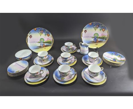 Noritake Tea Set, comprising seven cups, twelve saucers, twelve side plates, two bread and butter plates, a milk jug and suga