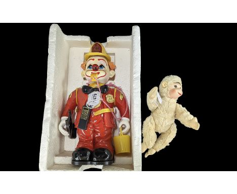 Vintage Toy - Clown Fire Chief, with ladder, radio, bucket and whistle,  measures 13'' high, untested.  Together with a vinta