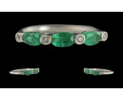 Ladies 18ct white gold superior quality diamond and emerald set ring, marked 18ct - marked to interior of shank. the emeralds