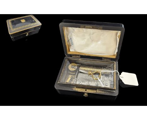 Vintage Wooden Musical Box by B A Bremond of Geneva, circa 1882, plays four tunes, with brass key.  Glass interior showing mu
