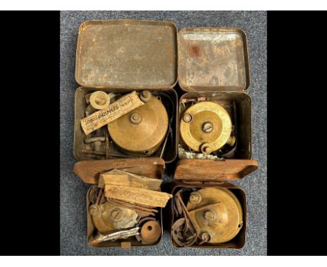 Box Containing a Number of Vintage Primus Stoves in original tins.