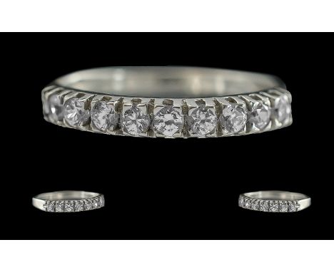 18ct white gold ladies - 9 stone diamond set ring, marked 750 - 18ct to interior of shank, the well matched round brilliant c