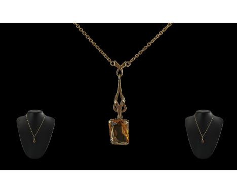 Ladies Vintage 9ct Gold Orange Citrine Set Pendant with 9ct gold chain marked 9.375, the step cut citrine of good colour and 