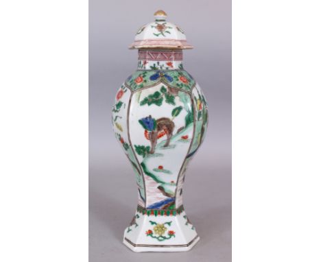 A 19TH CENTURY SAMSON KANGXI STYLE FAMILLE VERTE HEXAGONAL SECTION PORCELAIN VASE &amp; COVER, 12.25in high overall.