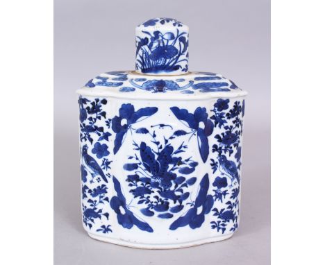 A 19TH CENTURY CHINESE BLUE &amp; WHITE PORCELAIN TEA CADDY &amp; COVER, of shaped oval section, the sides painted with butte