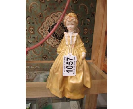 A Royal Worcester figurine 'Grandmother's Dress'.