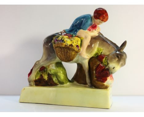 A Royal Worcester 'Boy and Donkey' modelled by Stella R Crofts (No.1) (firing mark/fracture to underside).
