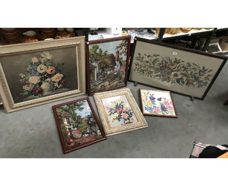A framed and glazed tapestry fire guard, 4 other framed and glazed tapestries and a large framed floral study