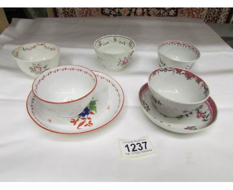 A selection of 18/19th century porcelain being 2 tea bowls with saucers and 3 other tea bowls including possibly Lowestoft po