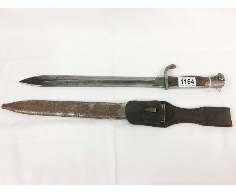 A German sword bayonet 1898/05 model with markings including maker Alex Coppel Solingen with scabbard &amp; frog