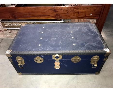A large cabin trunk with sheet music.