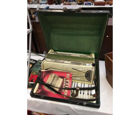 A deco Settimio Soprani three piano accordian with hard case (plays well)