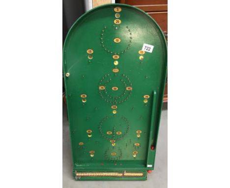 A green painted bagatelle