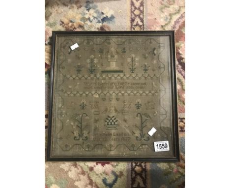 A framed and glazed sampler dated 1837.