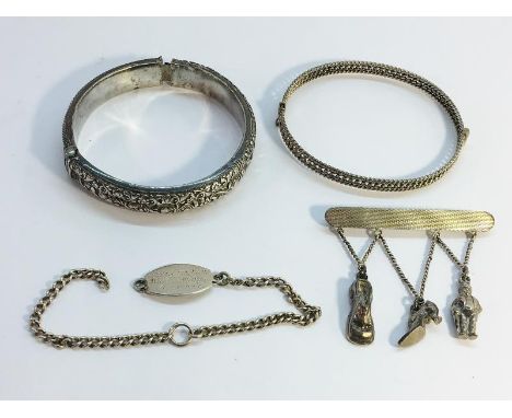 A Chinese silver bracelet, silver charm brooch, silver bangle &amp; a silver child's wristlet chain A/F