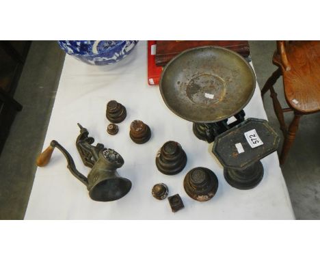 A set of scales with weights &amp; a hand cranked meat mincer