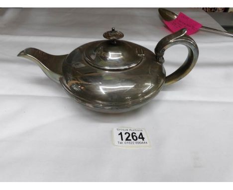 A Georgian silver teapot, hall marked London 1828/29, Crespin Fuller., 14.25 ounces.