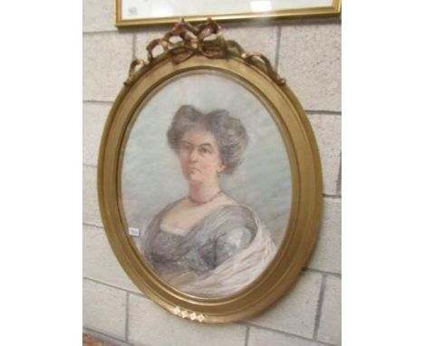 A gilt framed oval portrait entitled Bethia Clarke.