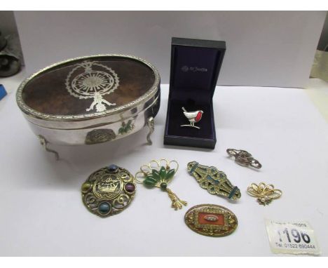 A silver and enamel St. Justin red robin brooch, 6 fashion brooches including Catherine Popesco, Celtic etc., and  a white me