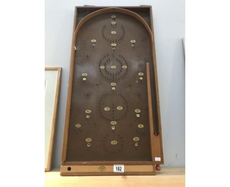 A bagatelle wooden game