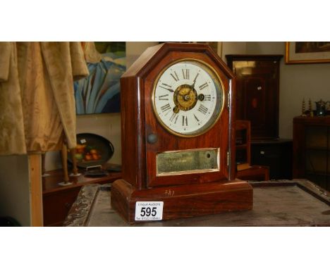 A Seth Thomas mantle clock with alarm