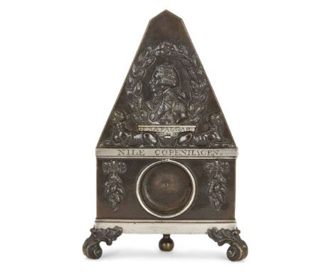 A Regency patinated and silvered bronze Battle of  Trafalgar commemorative pocket watch stand, early 19th century, in the for