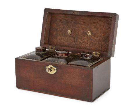 A George III mahogany tea caddy, late 18th century, with brass carrying handle, the interior with three tole cannisters, 12.5