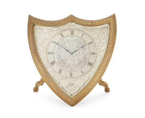 A gilt and silvered bronze strut clock, by Jose Rodriguez Losada, mid 19th century, the bronze case of shield form on strut s