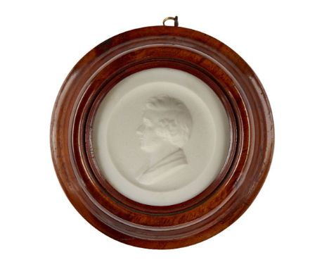 Attributed to David Morrison, active 1793-1850, a wax portrait relief of a gentleman, unsigned, in a circular moulded maple f