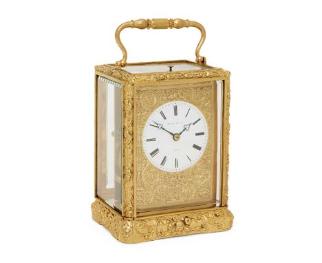 A French gilt brass repeating carriage clock, by Henry of Paris, late 19th century, the gilt brass case with relief floral de