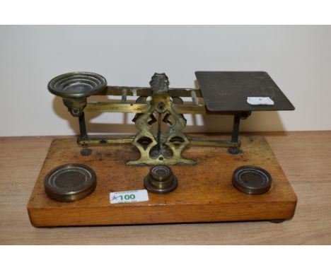 A set of 19th Century mahogany and brass postal scales, S.Mordan &amp; Co., with weights, measuring 25cm long