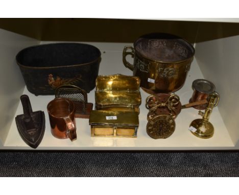 A collection of metal ware, including brass candle box, copper measuring jug, planter and similar.