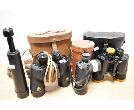 A pair of mid-20th Century Tecnar by Swift 10 x 50 binoculars, another pair of binoculars with Broad Arrow mark, and two vint