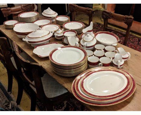 PART DINNER SERVICE, Spode 'Bordeaux' pattern with maroon and gilded border including 15 dinner plates, 10 soup bowls, 2 cove