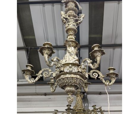 CHANDELIER, 117cm H, cast metal, with dolphin and cherub detail. 