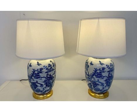 TABLE LAMPS, a pair, Chinese export style blue and white ceramic, with shades. (2) 