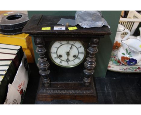 Oak cased mantle clock with glass front