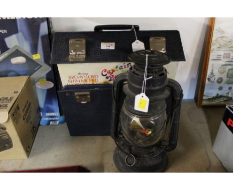 Storm lantern and box of records